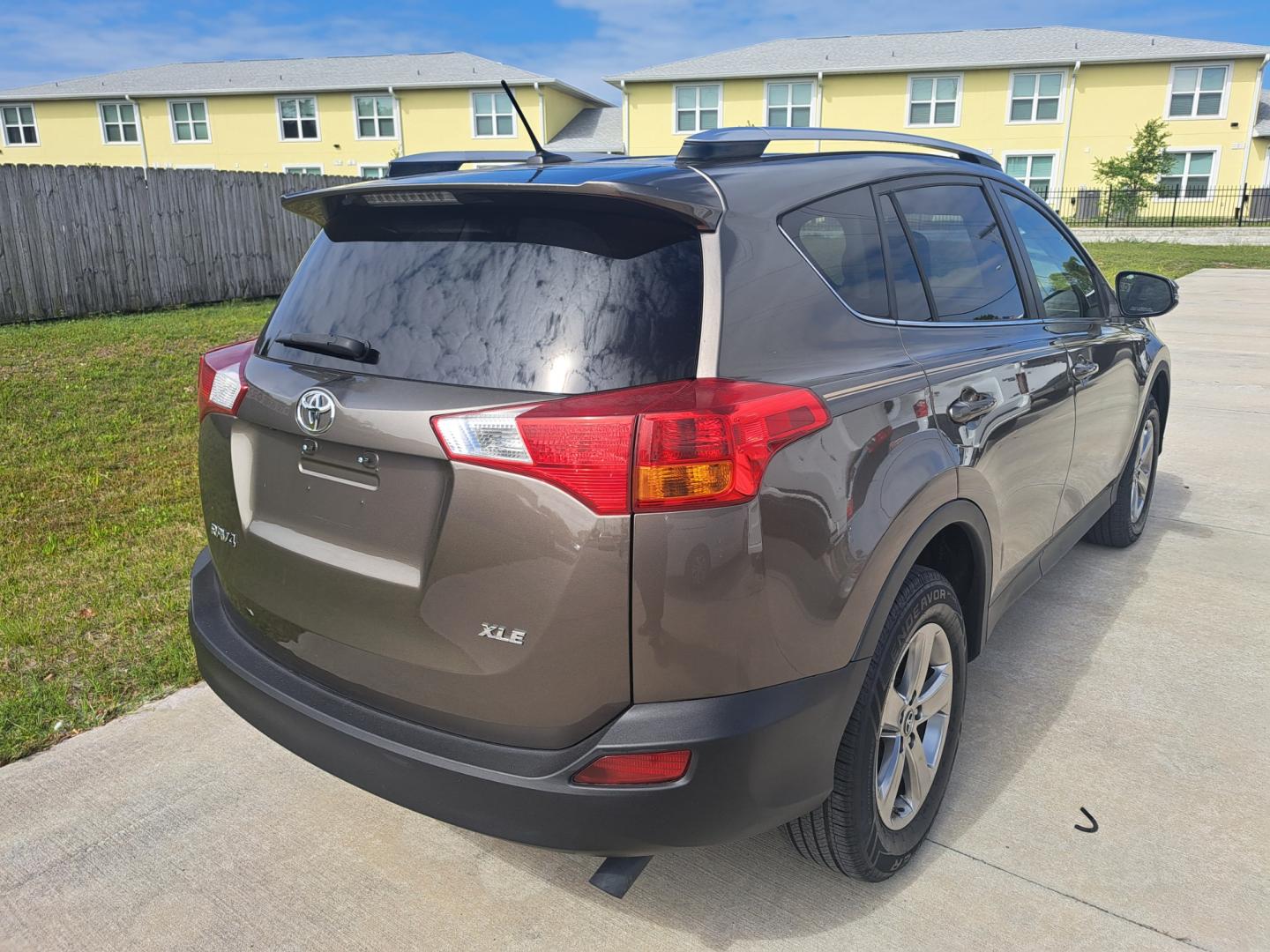 2015 BROWN Toyota RAV4 (JTMWFREV8FD) , AUTOMATIC transmission, located at 1181 Aurora Rd, Melbourne, FL, 32935, (321) 241-1100, 28.132914, -80.639175 - Photo#2